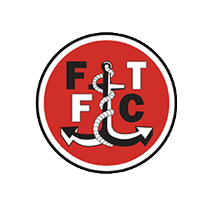 Round red emblem with a black and white anchor entwined by a rope and letters F, T, F, C around it.
